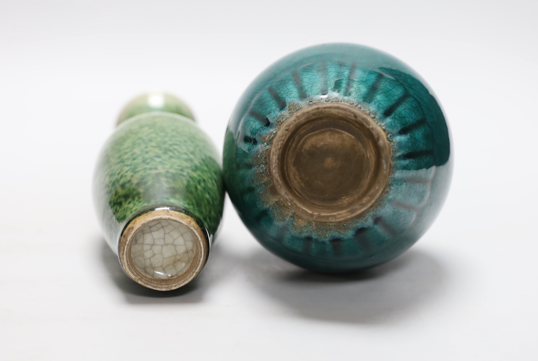A pair of Chinese sang de boeuf vases, another pair of Chinese mottled green bottles vases, two pink ground prunus vases and a turquoise glaze bottle vase, tallest 23cm (7)